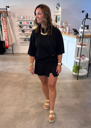 Woman in a black outfit 