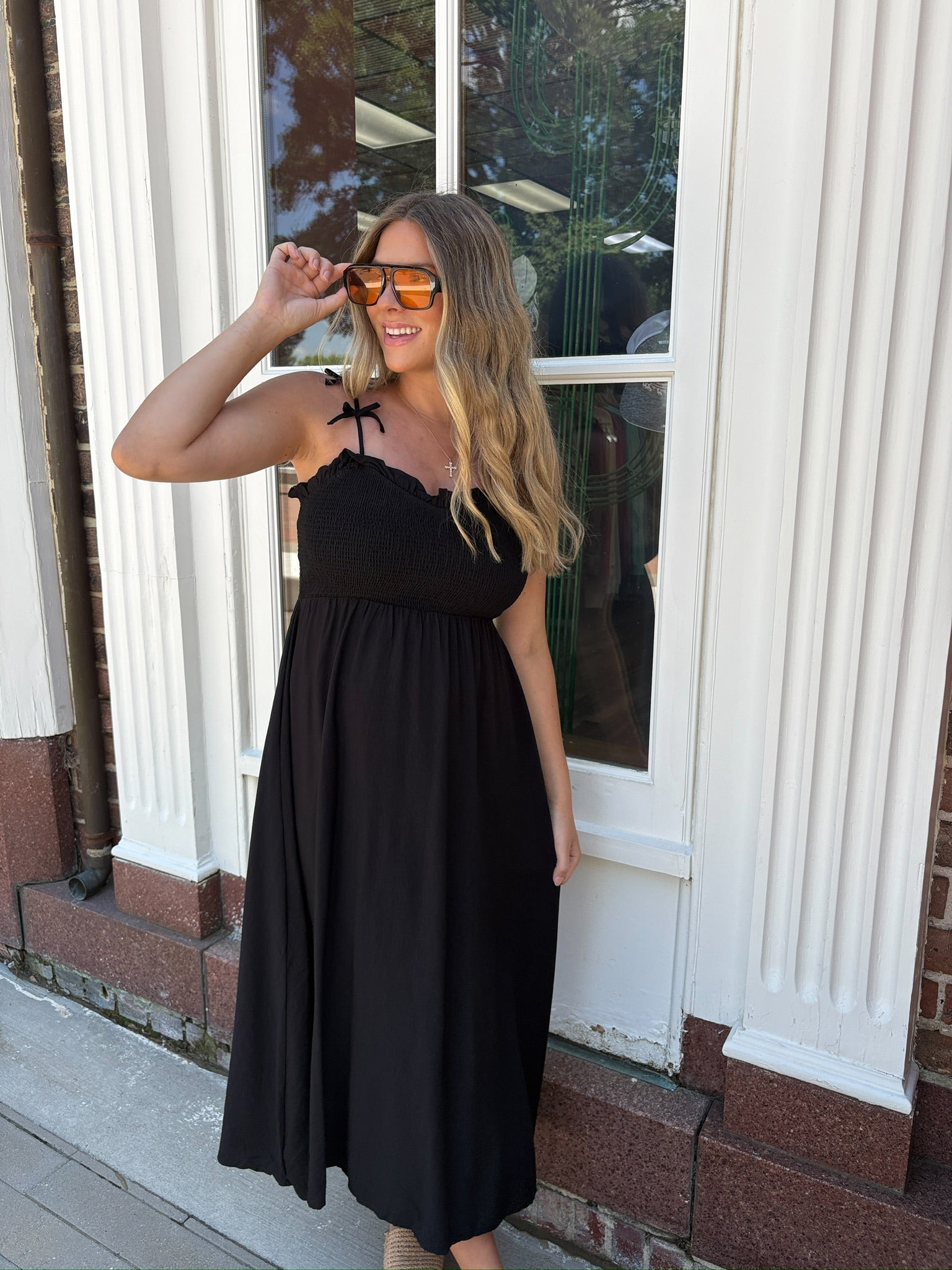 Black midi dress with bow strap details