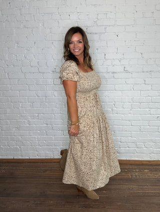 Beige and brown floral print short-sleeve midi dress.