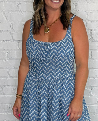 Sleeveless blue and white embroidered chevron-patterned midi dress