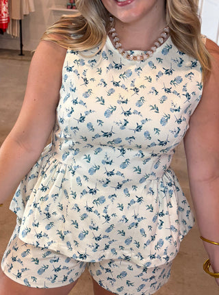 Women in a blue floral matching set