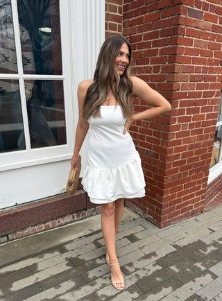 White strapless dress, perfect for graduation and bridal events.